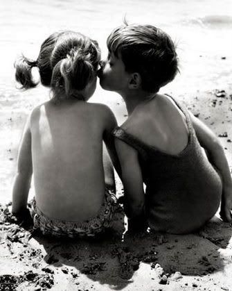 black and white photography kissing. kids kissing (lack and white)